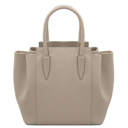 Taupe Italian leather handbag with pebbled texture, structured shape, and two rounded top handles.