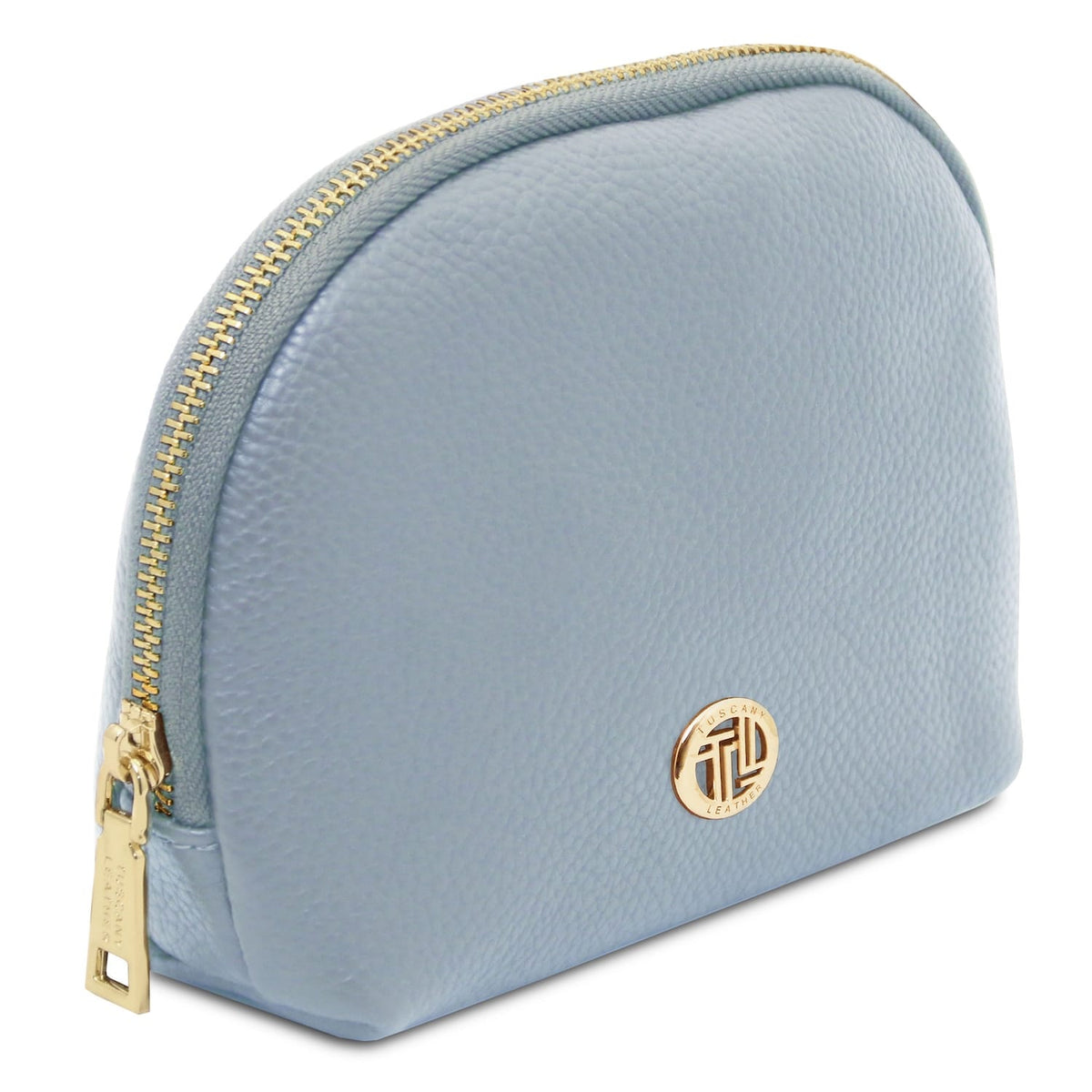 Soft blue leather toiletry case with gold-tone zipper and round metallic emblem detail on front.