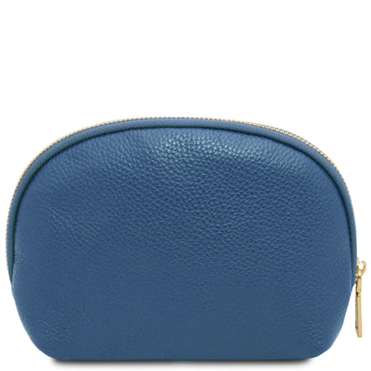 Blue soft piel granulada toiletry case featuring a rounded top zipper and diseño minimalista.