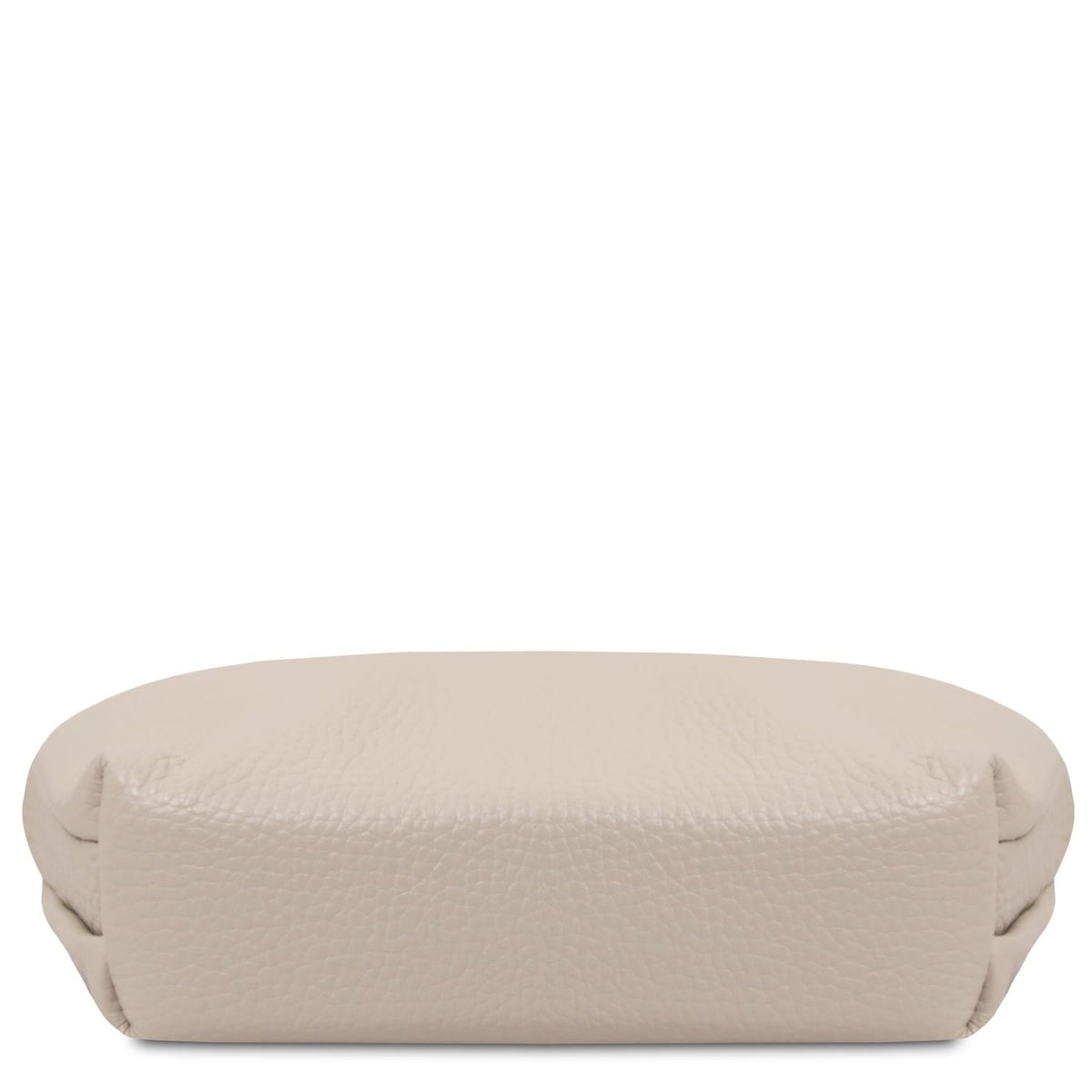 Soft beige piel plena flor toiletry case with textura granulada and rounded edges, designed for travel organization.