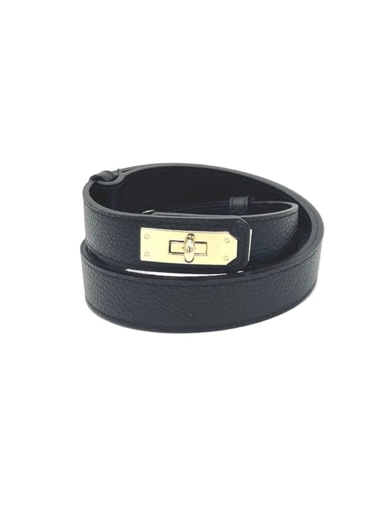 Women’s Adjustable Skinny Leather Belt – Handcrafted in Italy in black pebbled leather with gold-tone rectangular buckle detail.