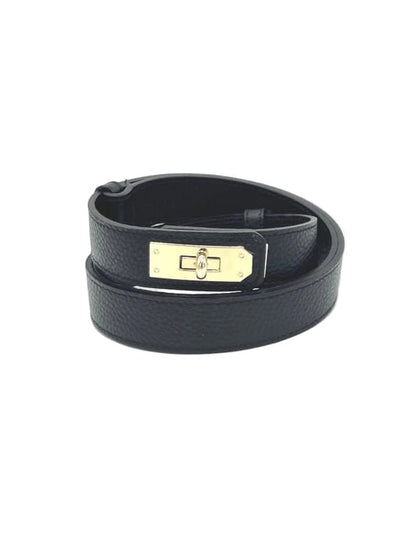 Women’s Adjustable Skinny Leather Belt – Handcrafted in Italy in black pebbled leather with gold-tone rectangular buckle detail.