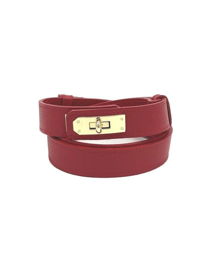 Women’s Adjustable Skinny Leather Belt – Handcrafted in Italy in deep red leather with gold-tone buckle and textured finish.