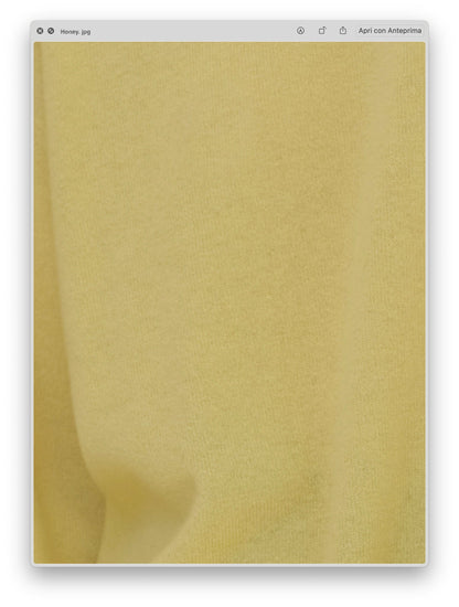 Primer plano of amarillo pálido textura de punto