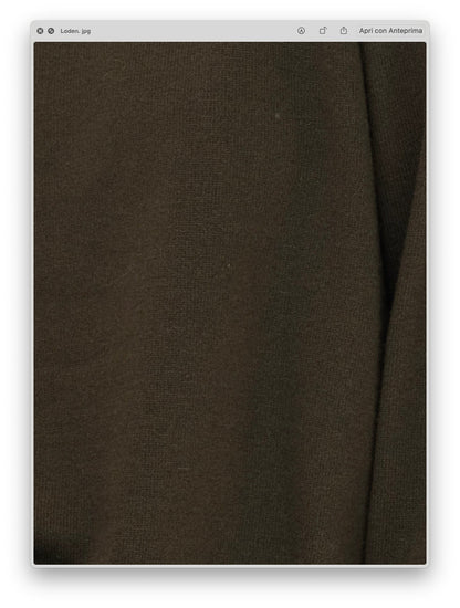 Close-up of soft, finely knit fabric in deep loden green showcasing the texture of the Wool & Cashmere Mix Maxi V-Neck Sweater.