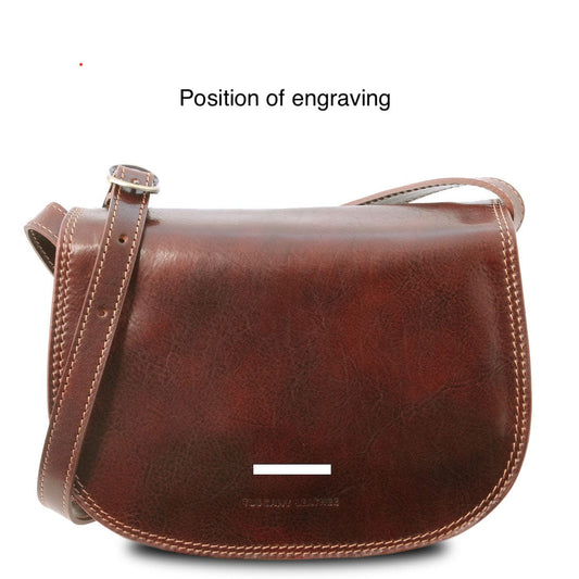 Isabella - Lady leather saddle bag | TL9031 in brown Italian leather with contrast stitching and adjustable strap on white background